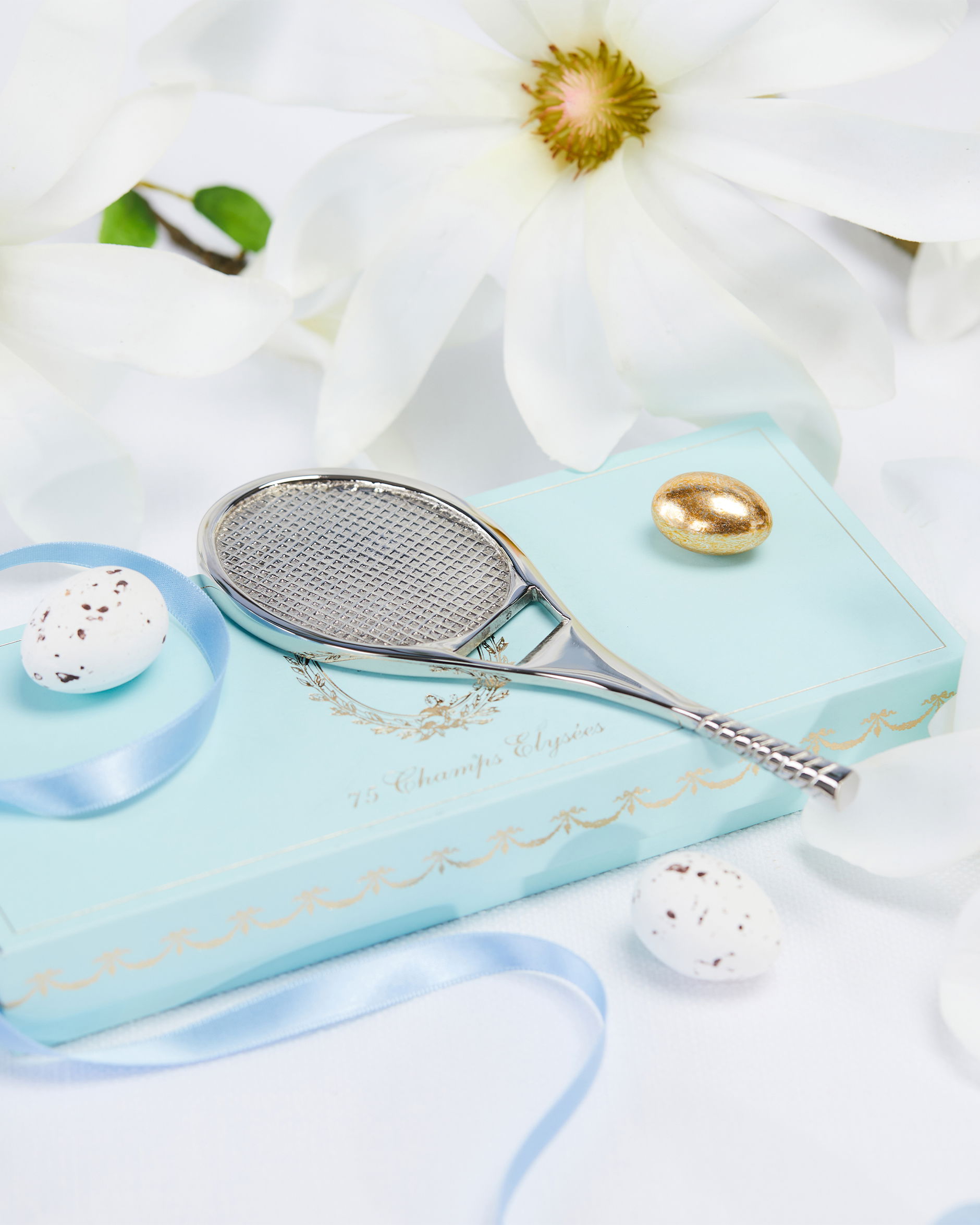 Tennisrack flasköppnare silver