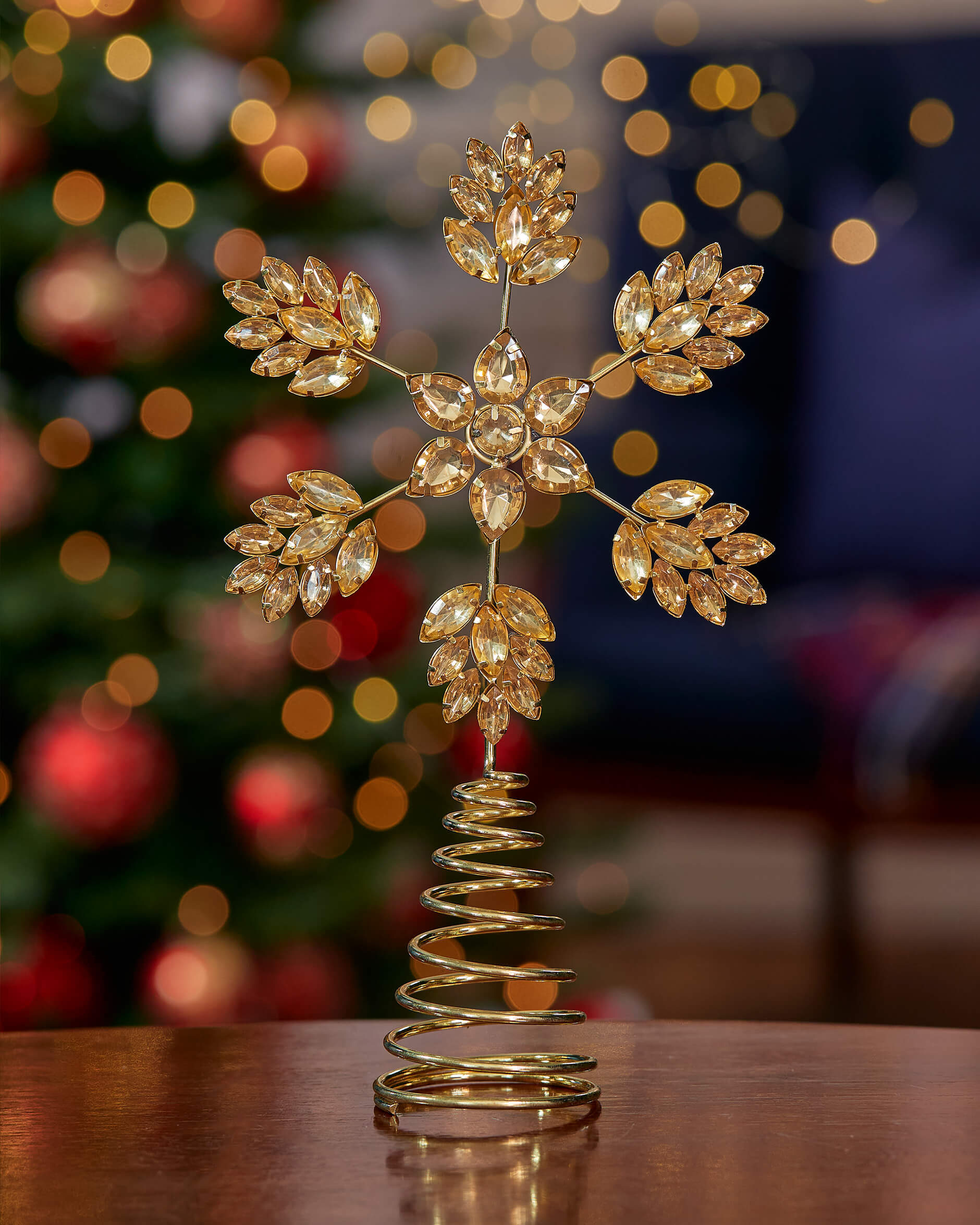 Aurora toppstjärna guld