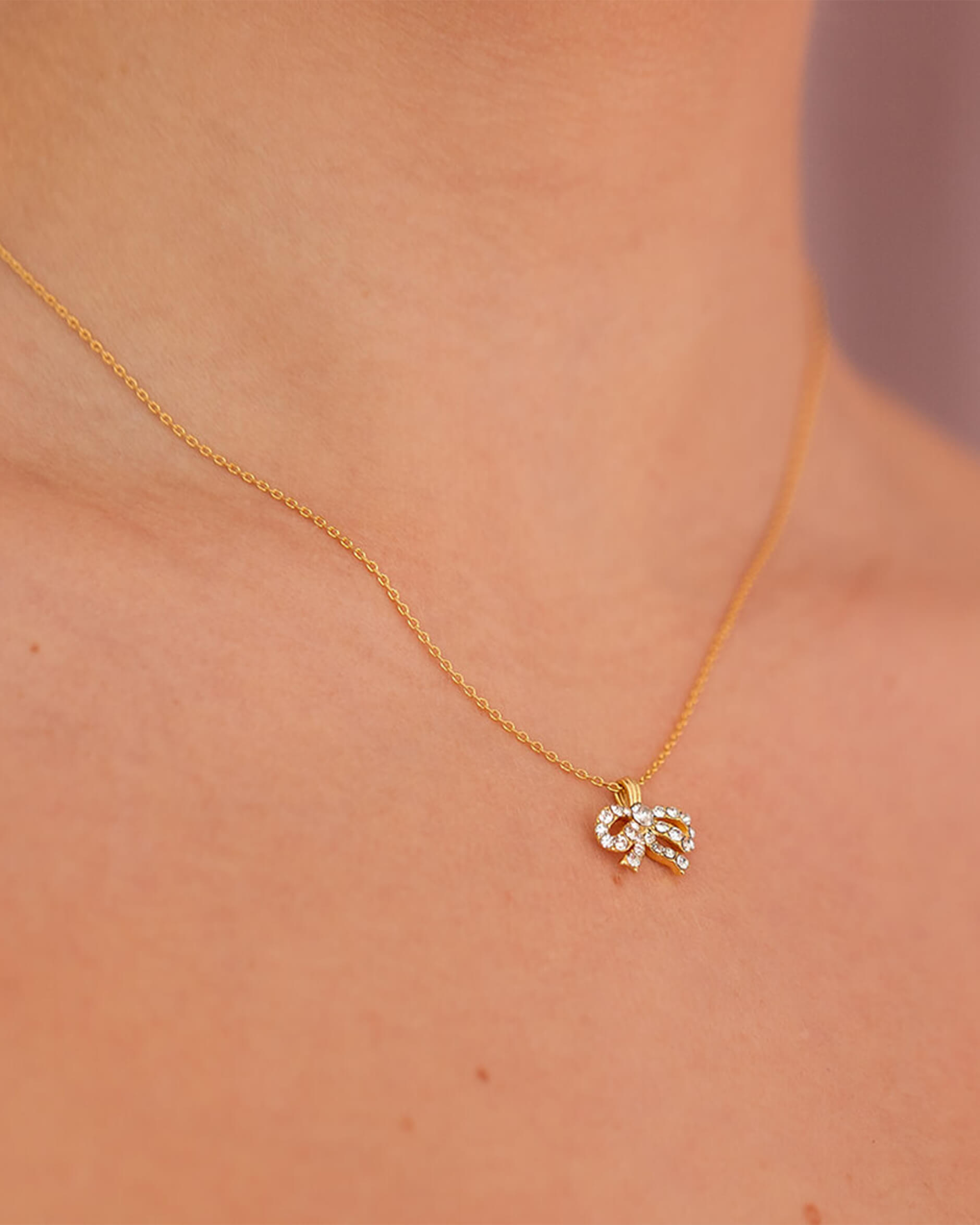 Petite Antoinette bow kaulaloru crystal