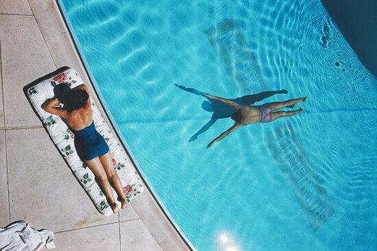 Swimmer And Sunbather