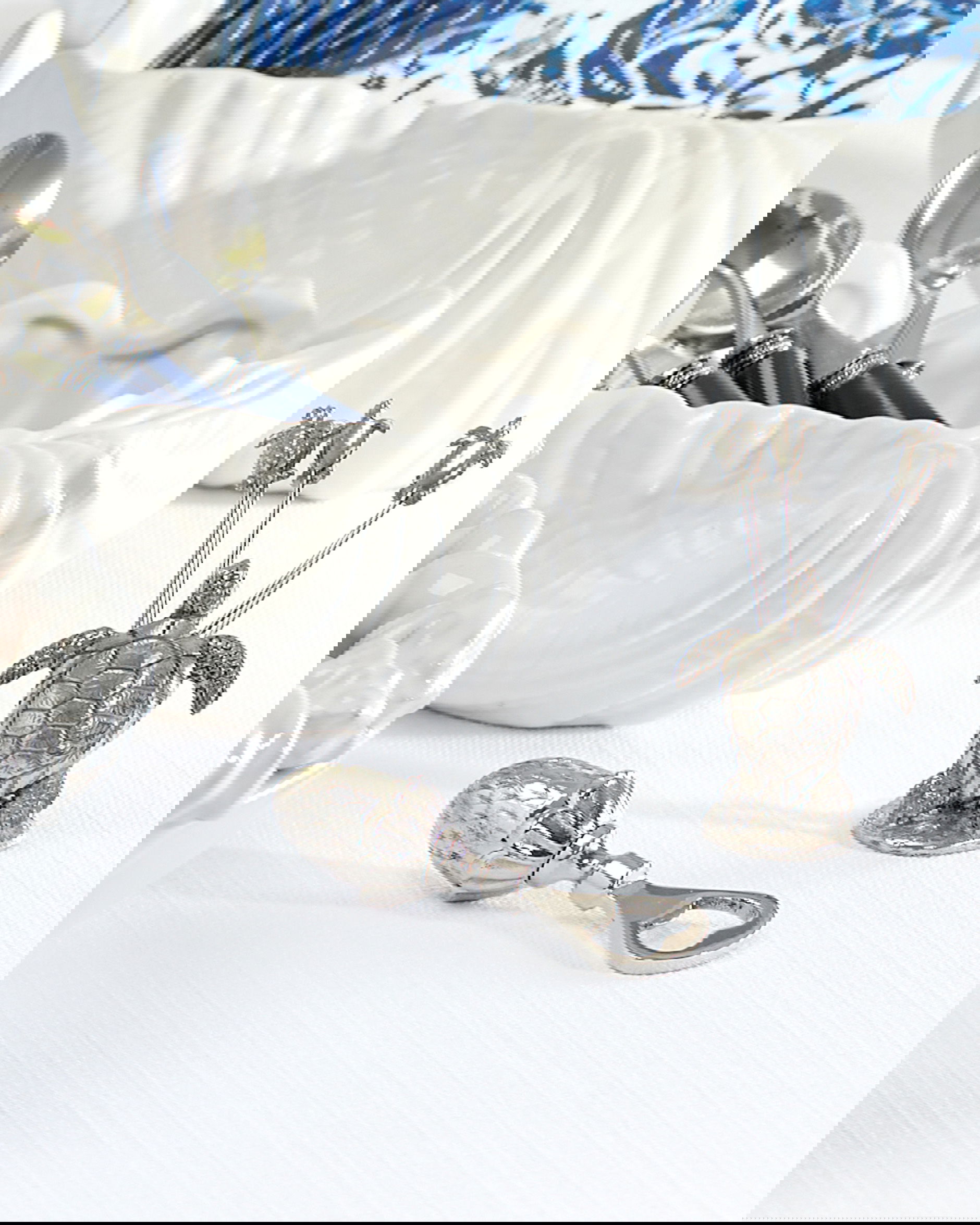 Ekollon-pullonavaaja, hopea