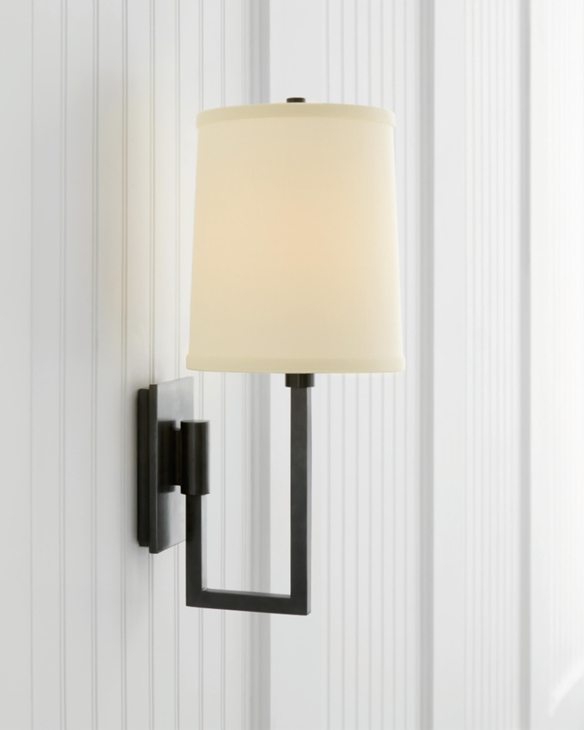 Aspect Library vägglampa brons