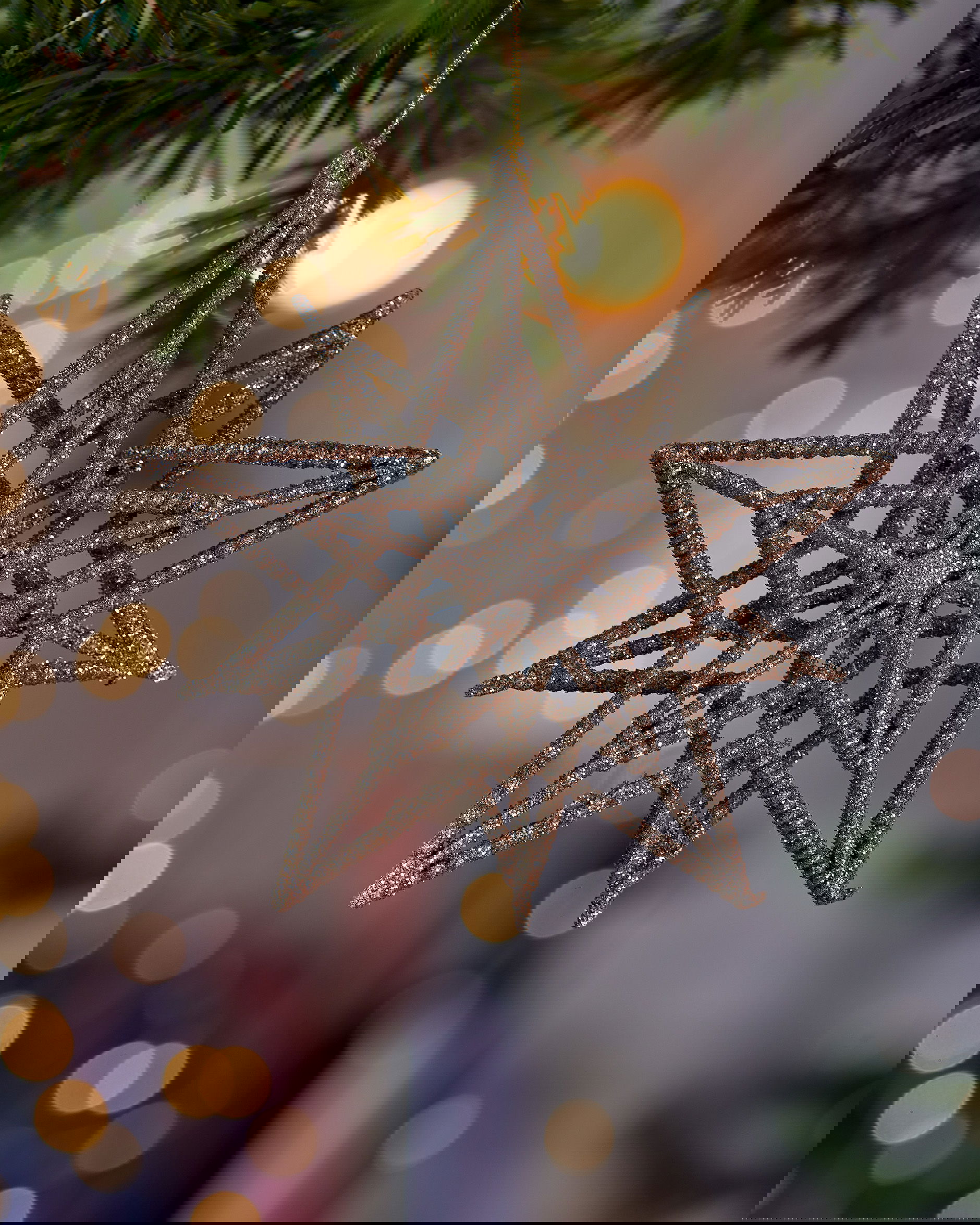 León stjärna julgransdekoration guld