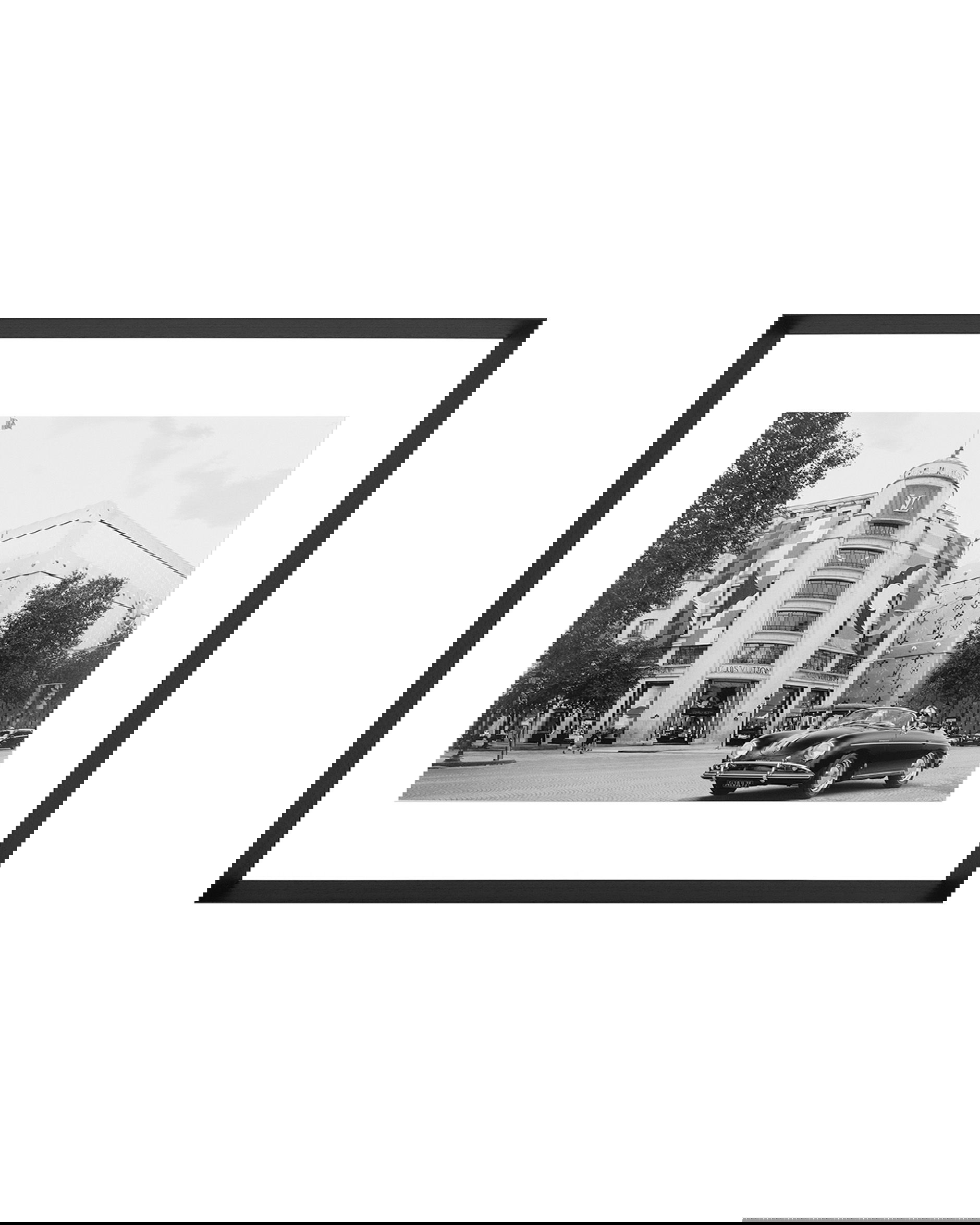 Luxury car in front of store