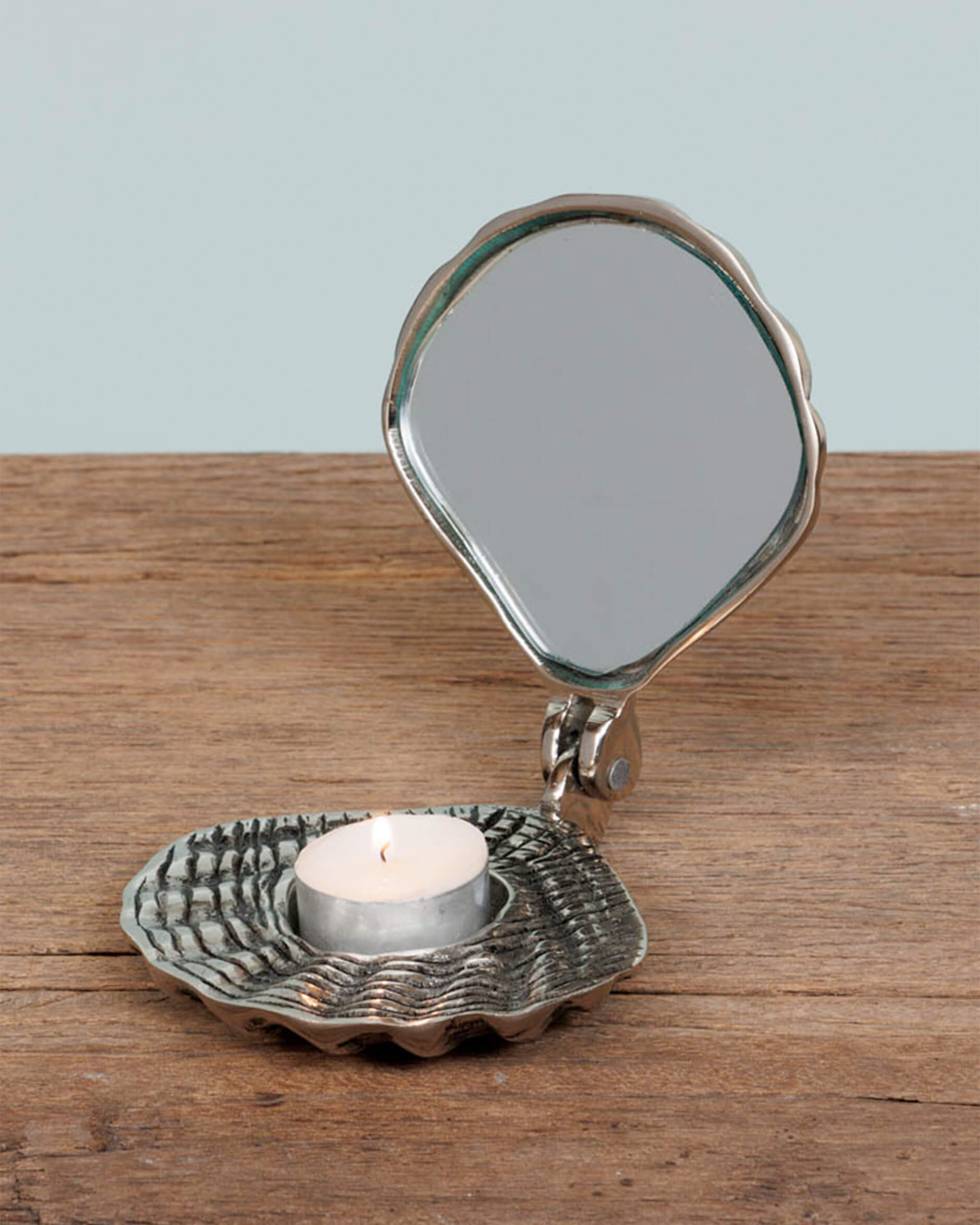 Snäcka ljushållare silver