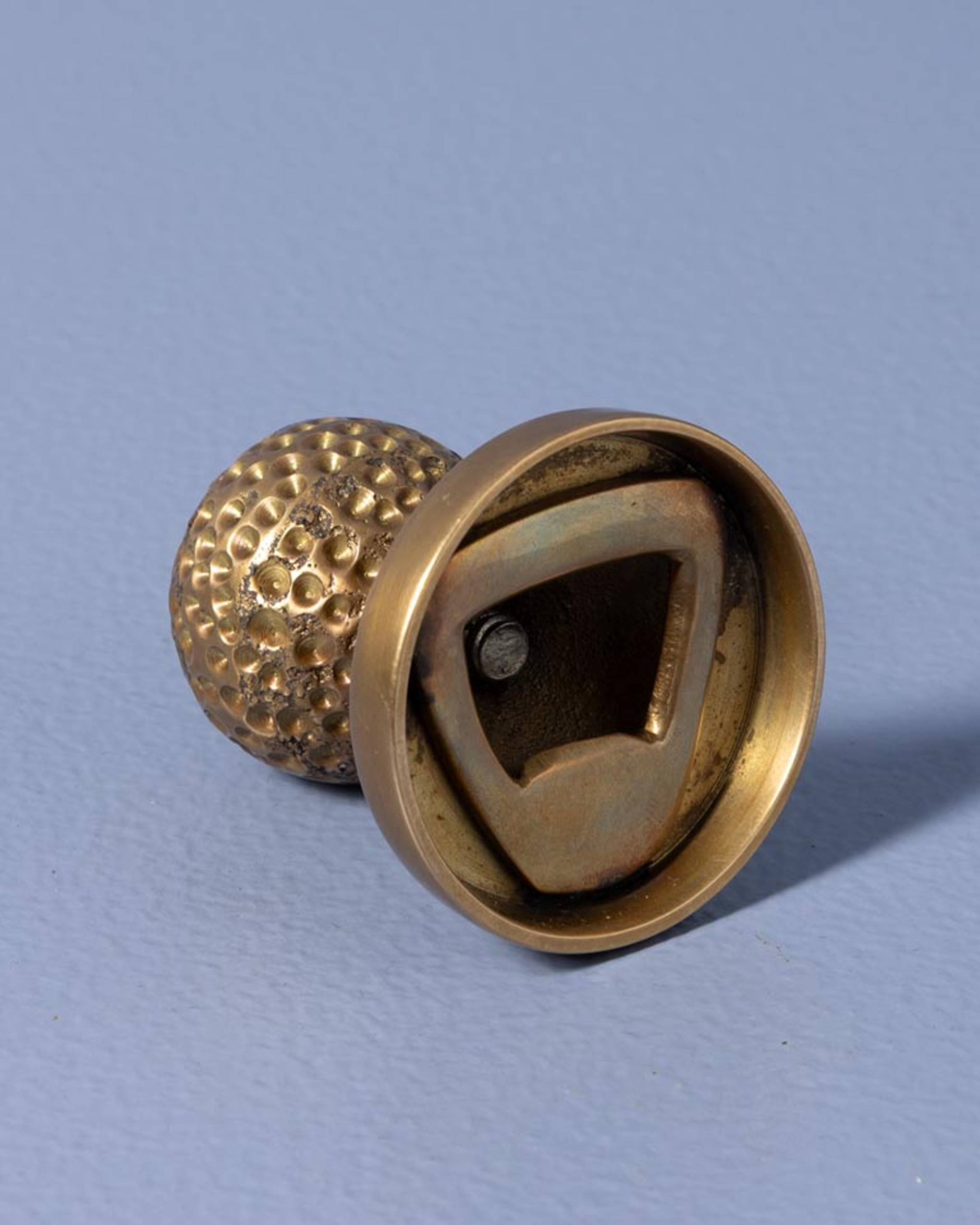 Walden paperweight and bottle opener