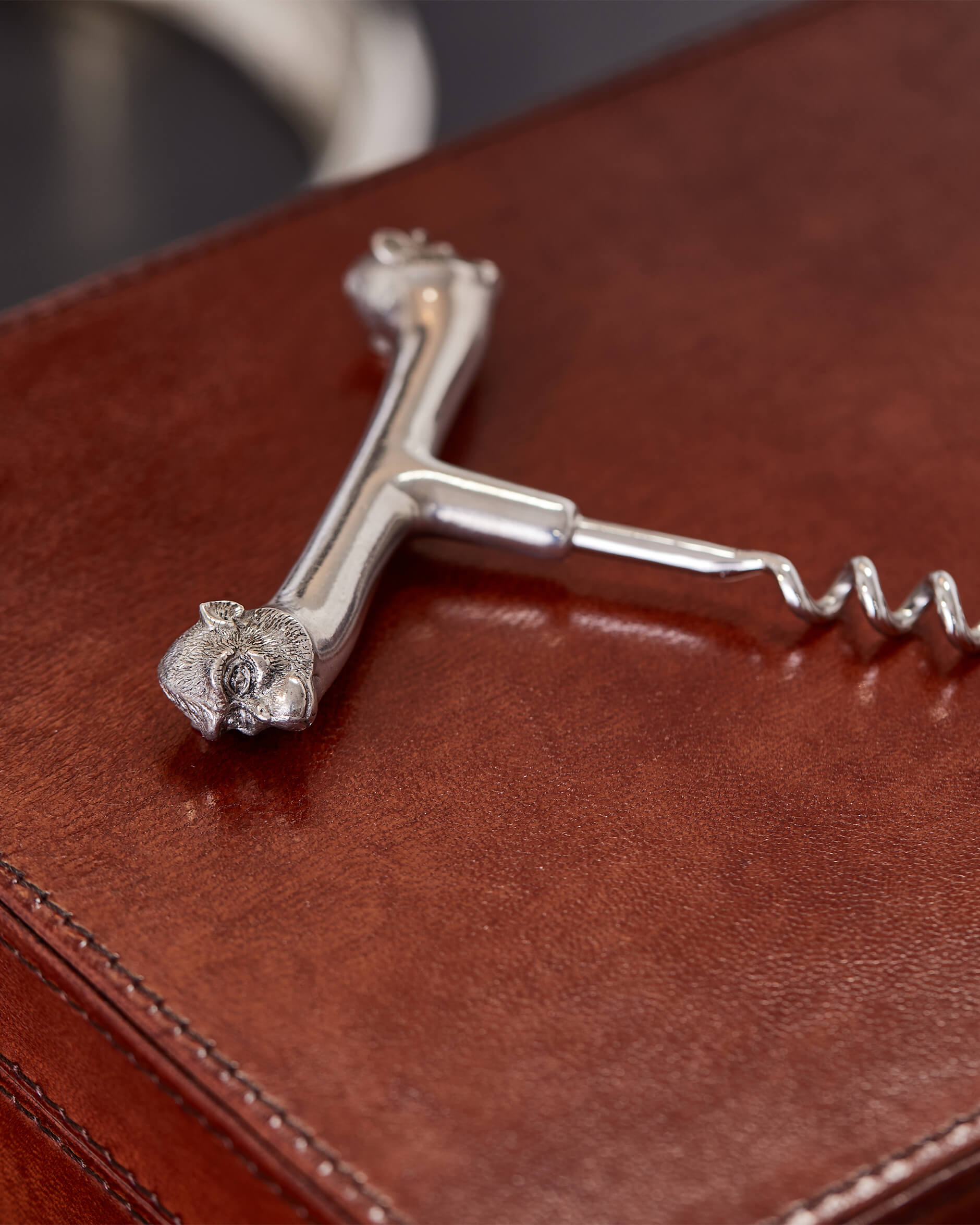 Apa flasköppnare tenn