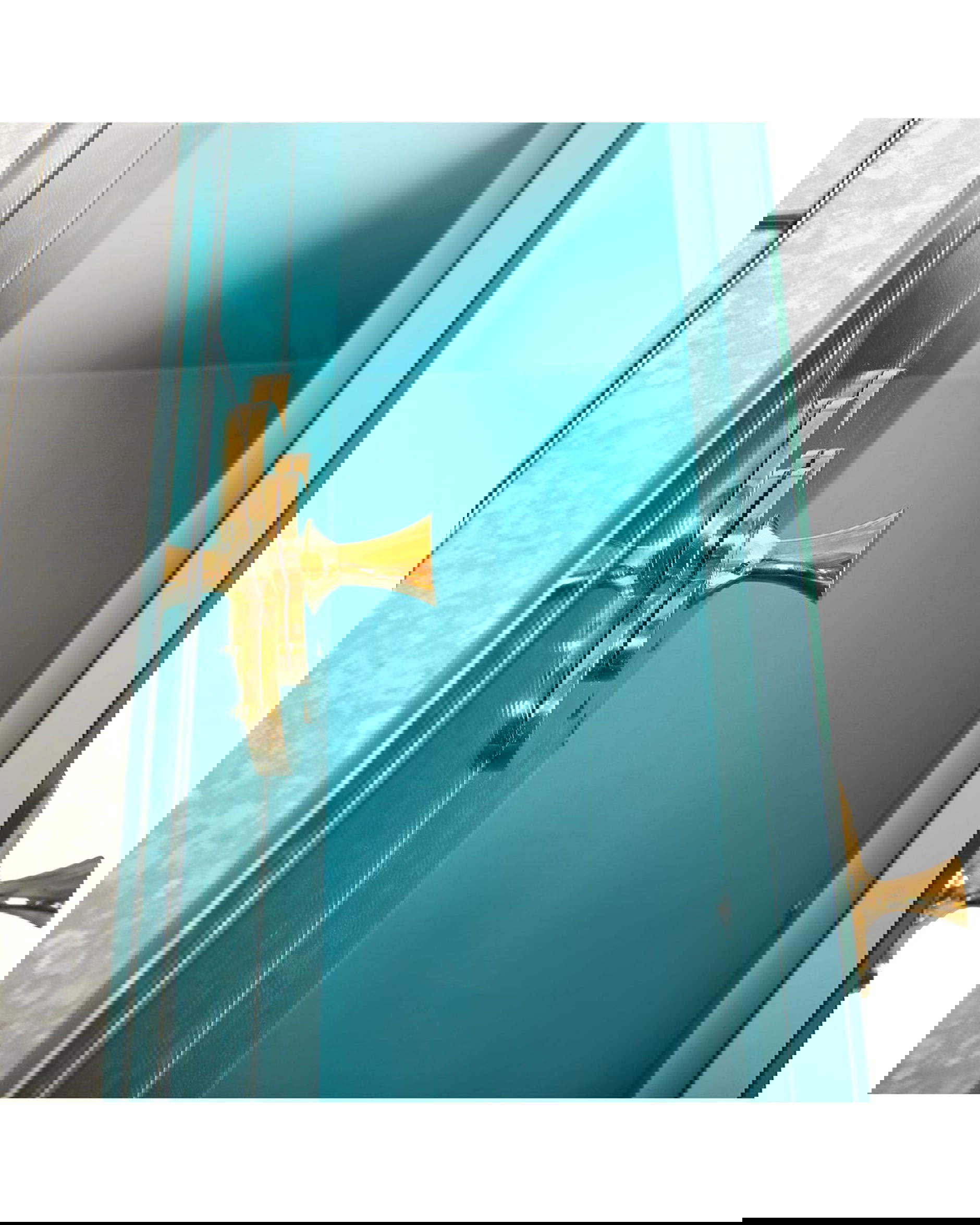 Delphine byrå mässing