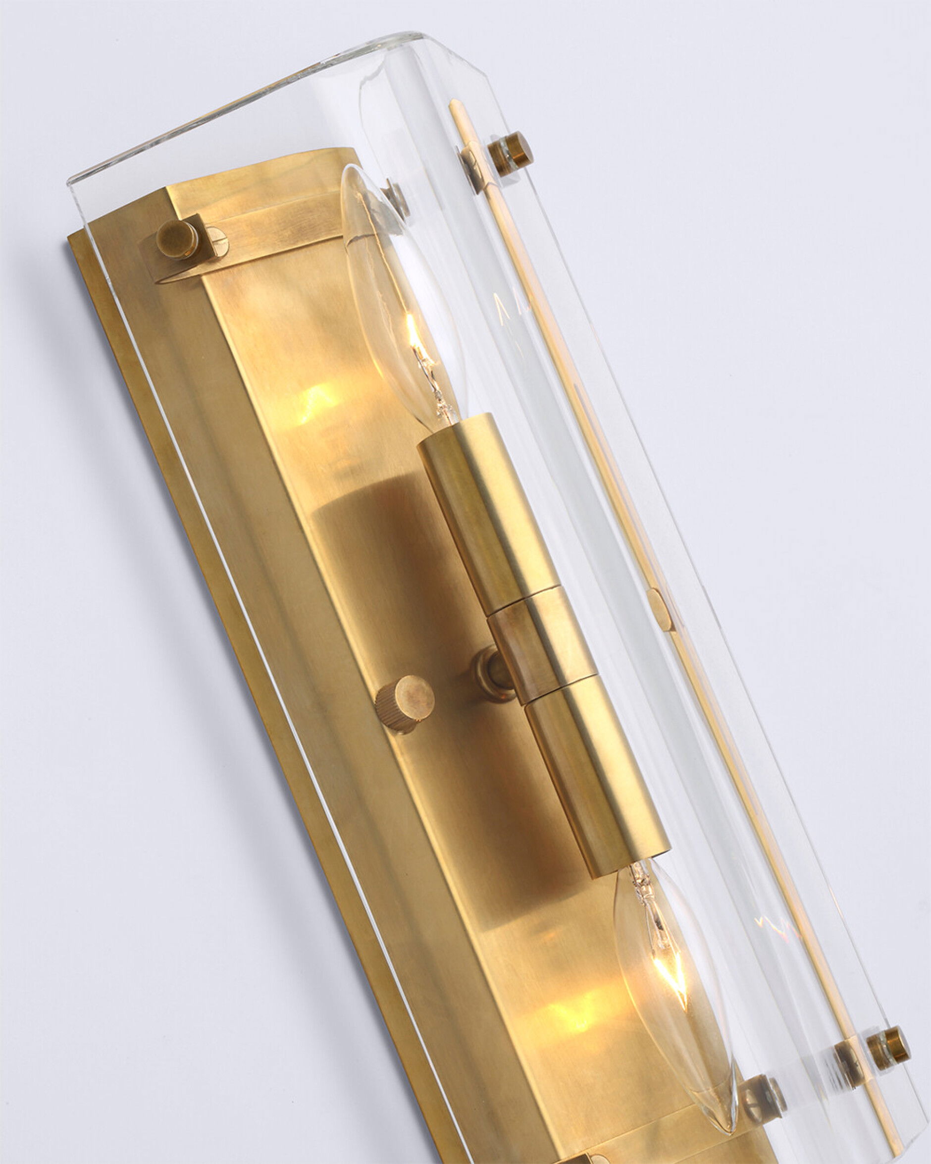 Clayton 25" vägglampa crystal/mässing