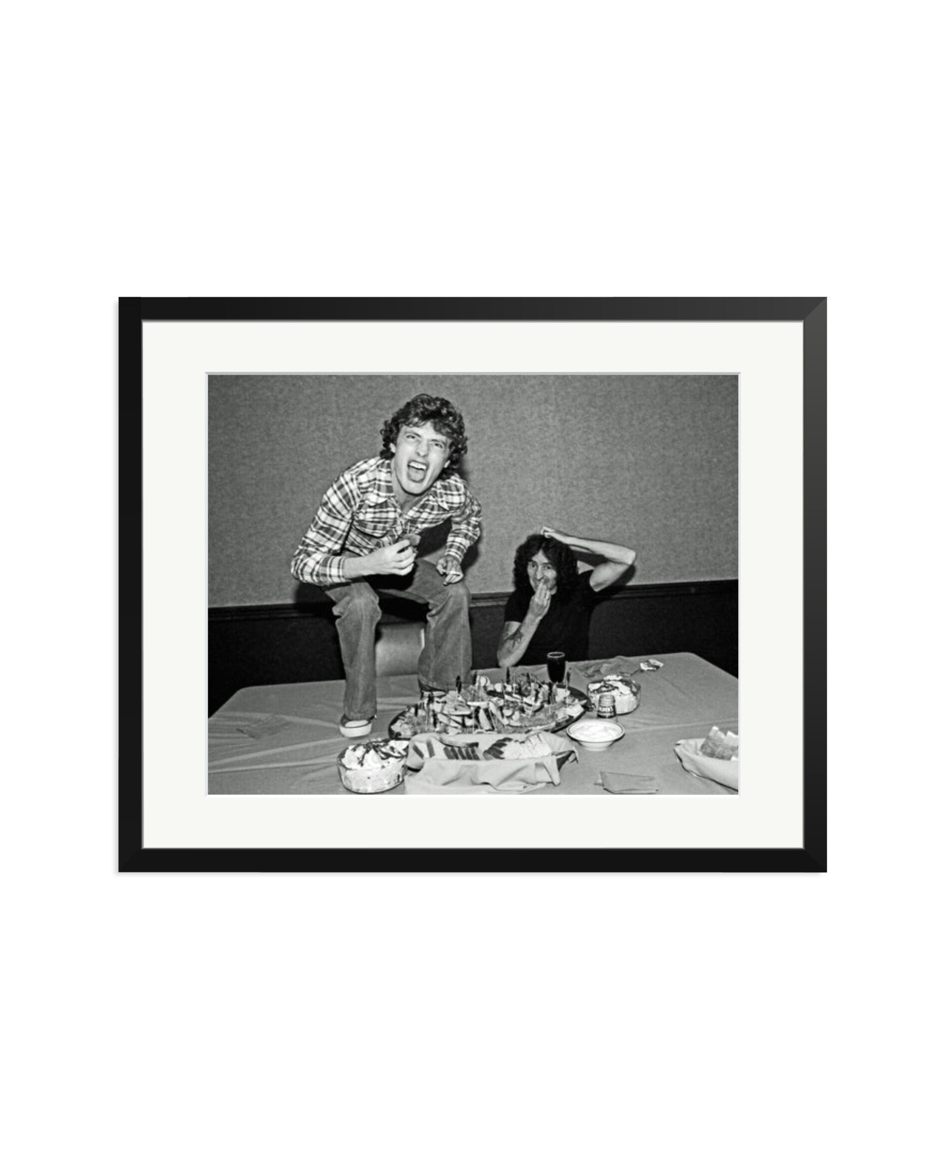 Angus Young and Bon Scott at Lunch, 1977 Black / XL