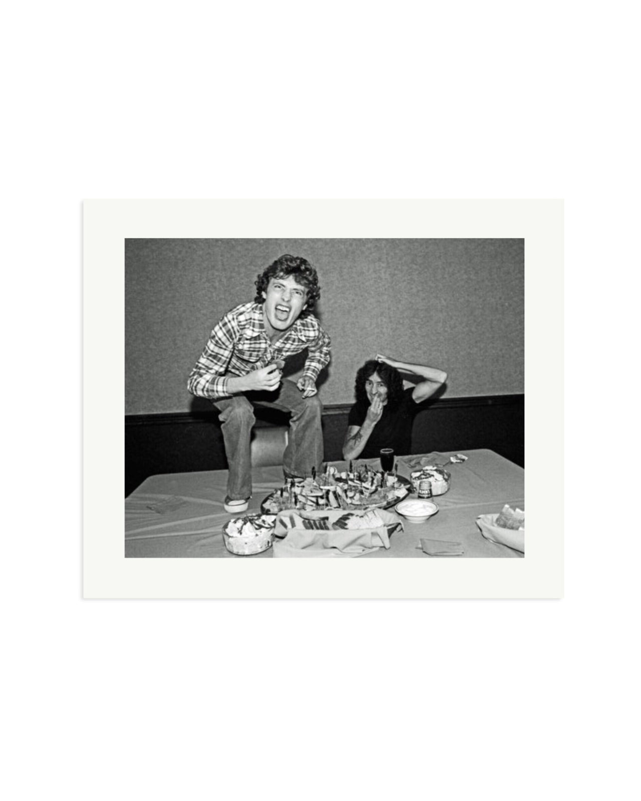 Angus Young and Bon Scott at Lunch, 1977 Print Only / Large