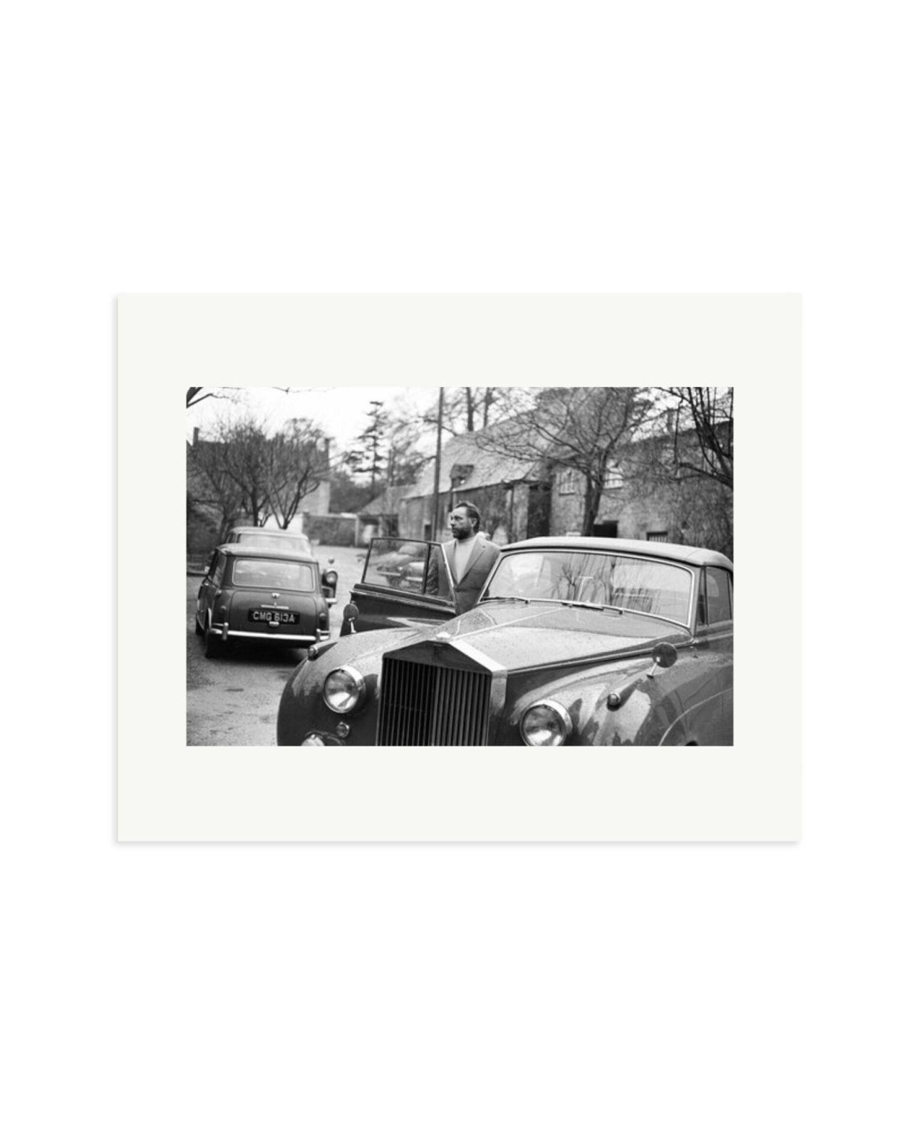 Burton getting into his Rolls Royce Print Only / Medium