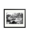 Burton getting into his Rolls Royce Black / Large
