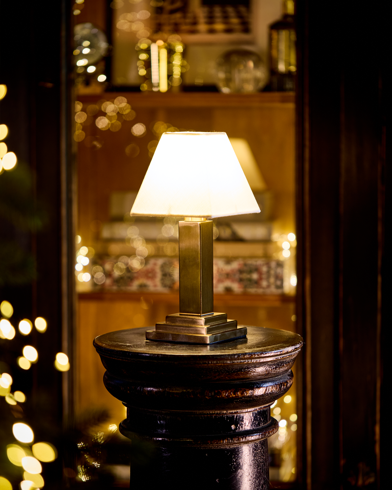 Charles portable table lamp in vintage brass
