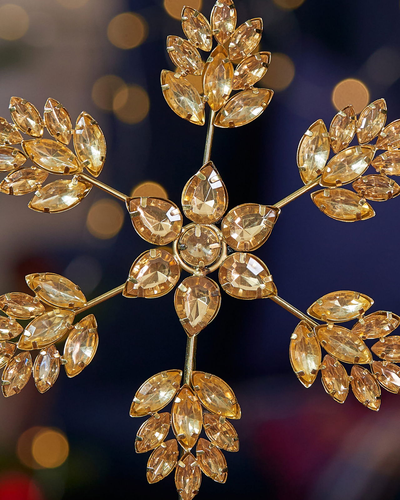 Aurora toppstjärna guld