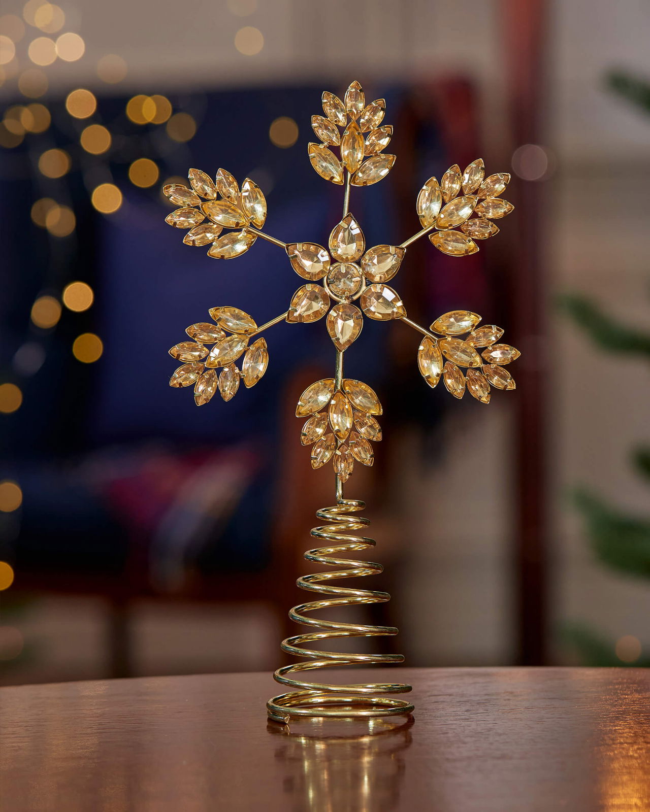 Aurora toppstjärna guld